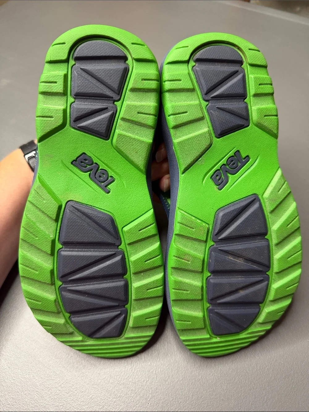 Kid’s Teva Navy and Bright Green Hook-and-Loop Sandals. Size: 2.